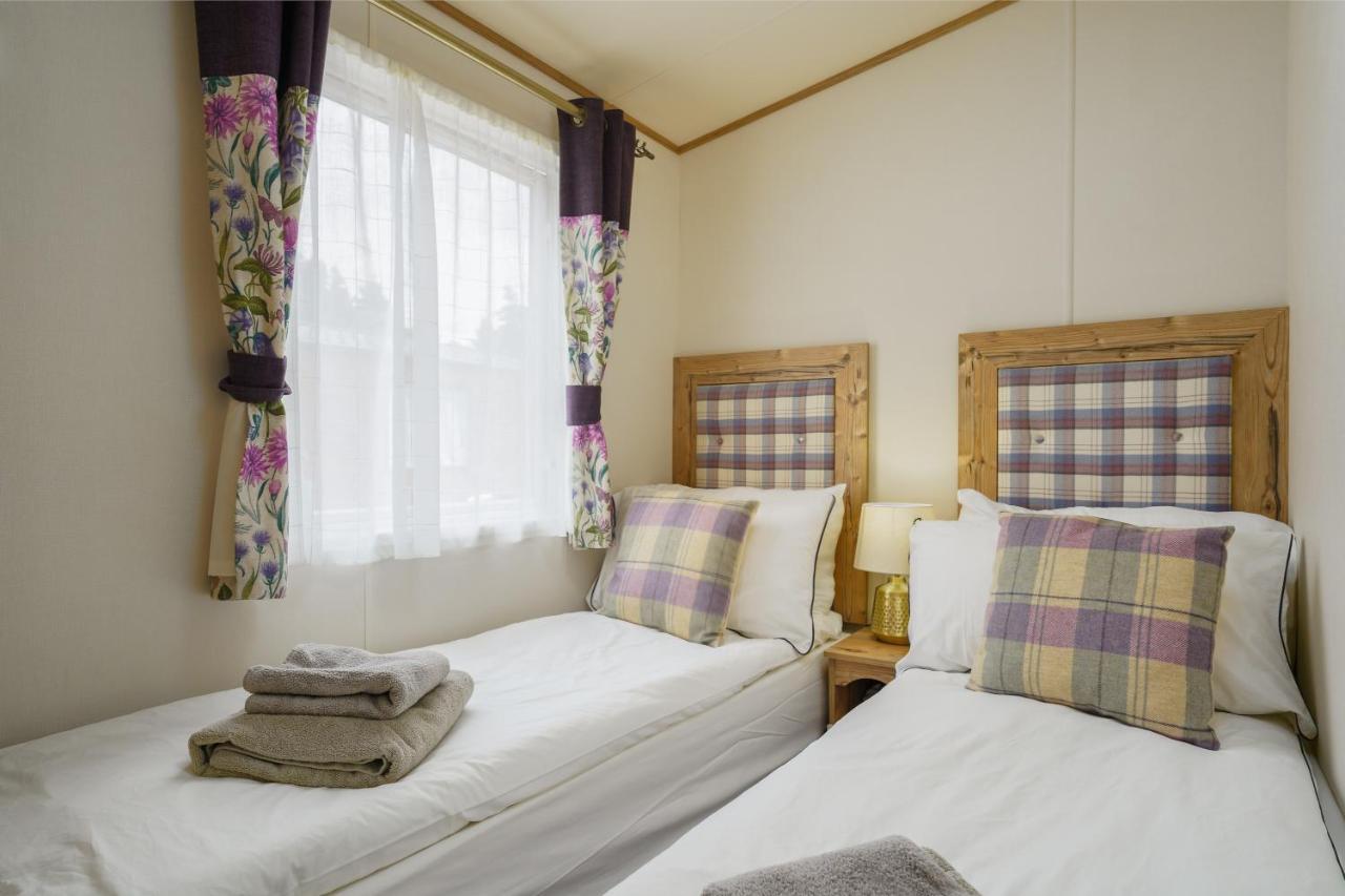 Dunroamin Lodge Aviemore Esterno foto